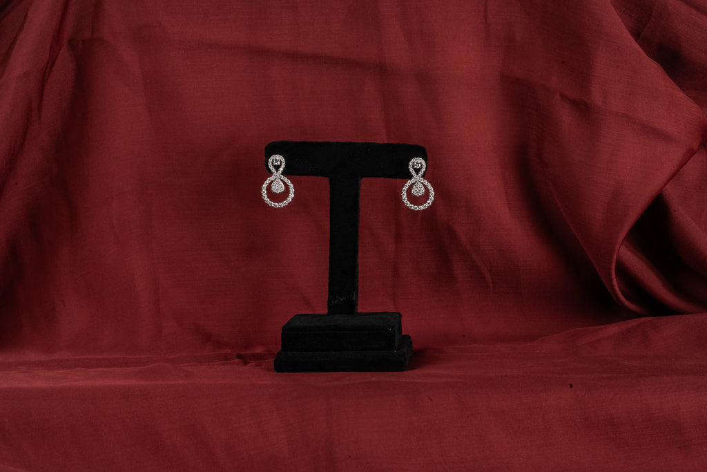 Silver Infinity Drop Earrings – Front View – Silver Moissanite – Myraé