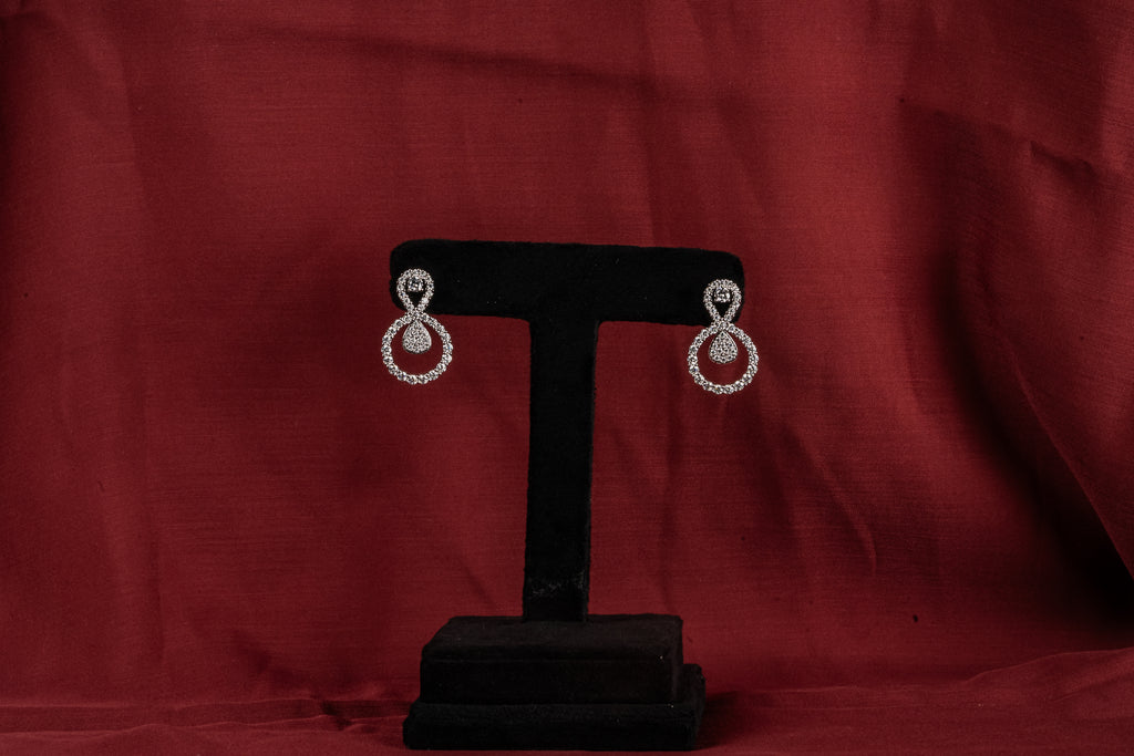 Silver Infinity Drop Earrings – Side View – Silver Moissanite – Myraé