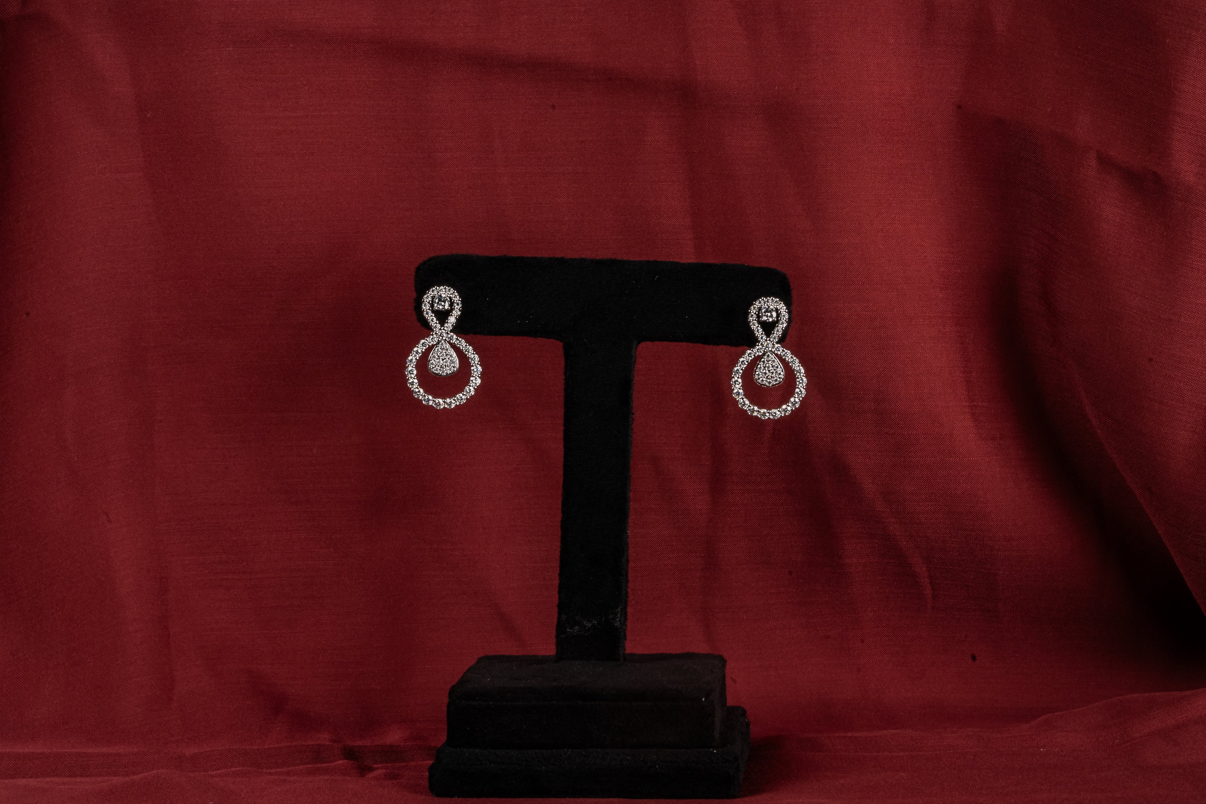 Silver Infinity Drop Earrings – Side View – Silver Moissanite – Myraé